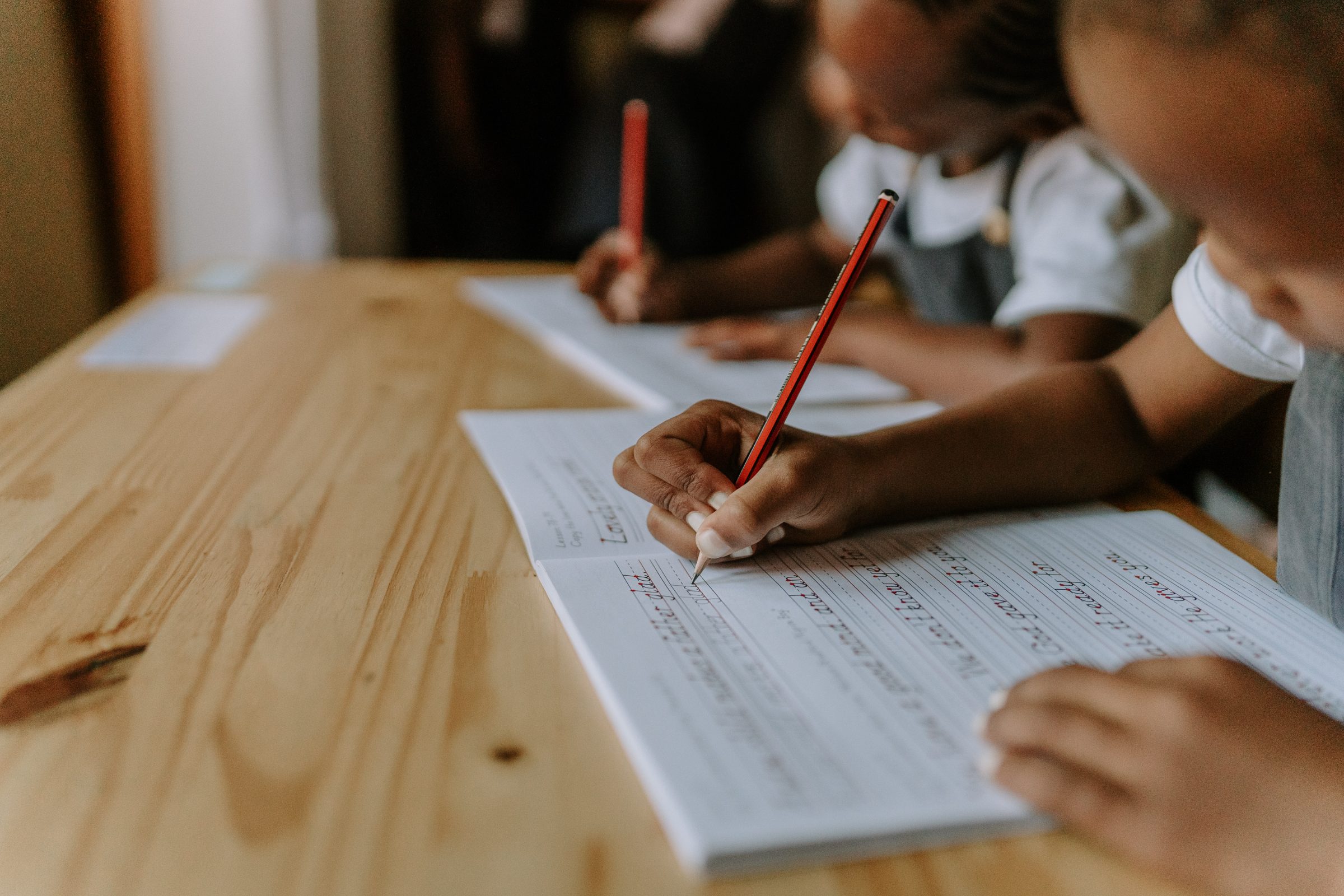 Children practising handwriting